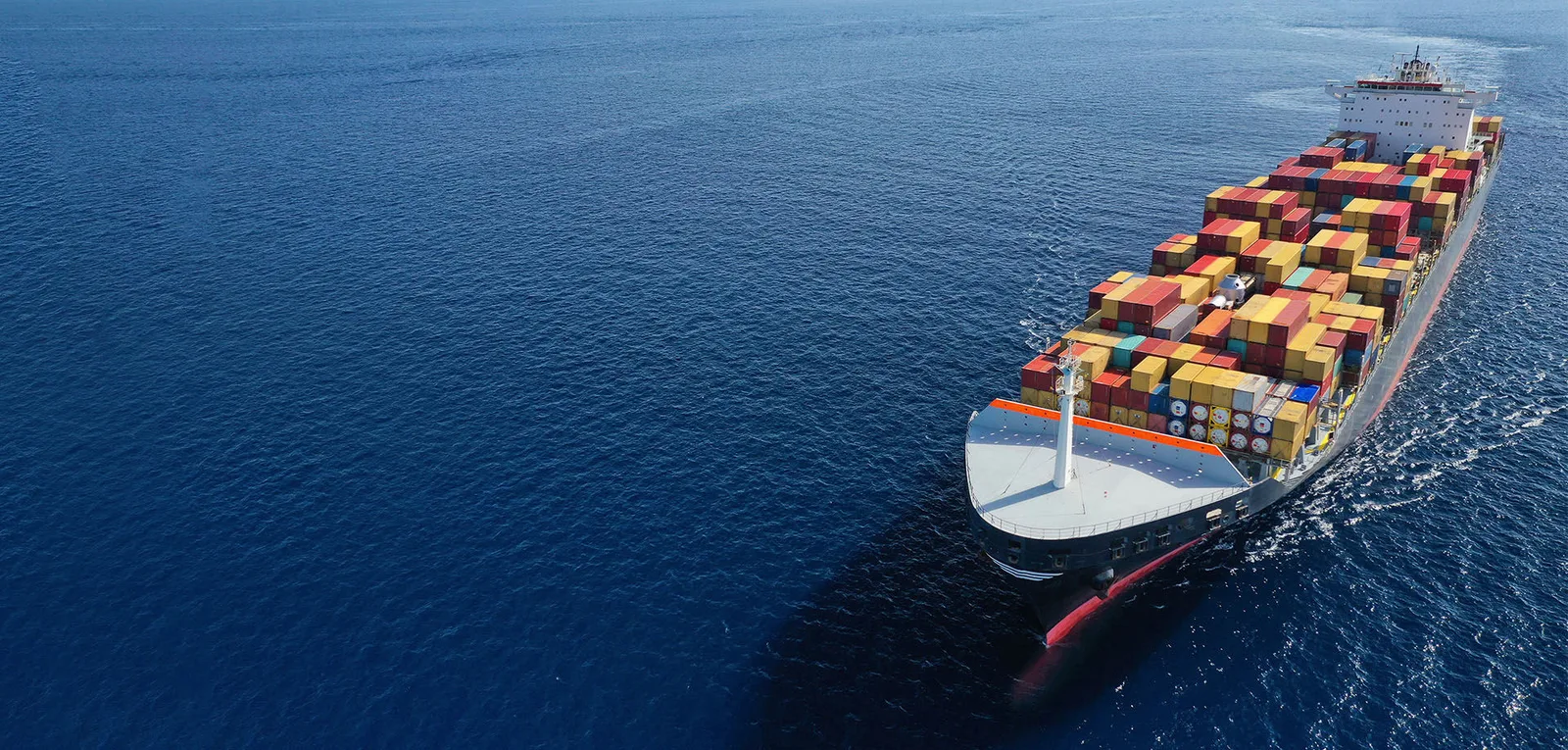Merchant container vessel underway, viewed from above
